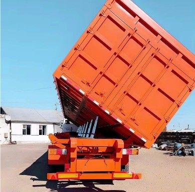 Déchargeuse de décharge à roulement latéral de semi-remorque pour camions, remorques de pierre, acier et sables