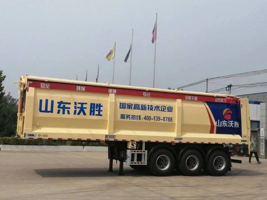 Semi-remorque à décharge arrière avec décharge automatique par courroie de traction et charge utile maximale de 30 à 60 tonnes